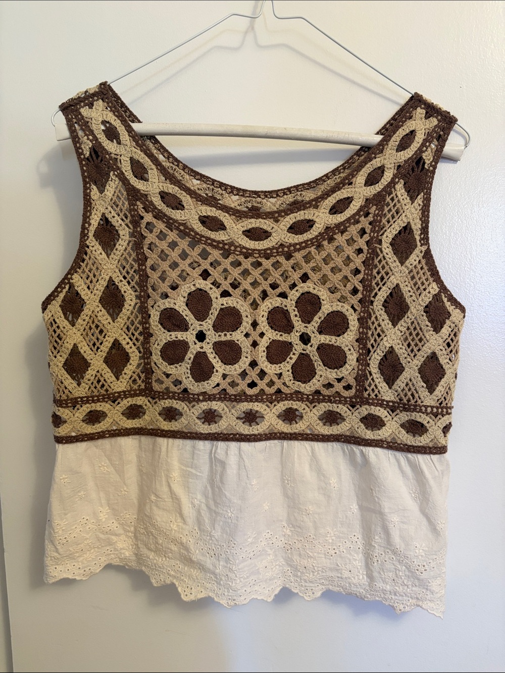 boho-style crochet tank top with eyelet lace on the bottom